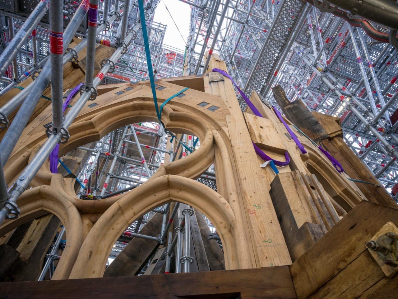 The new spire of Notre-Dame de Paris takes shape: openwork wooden ornaments are being mounted, to be covered in chased lead, just as was done before