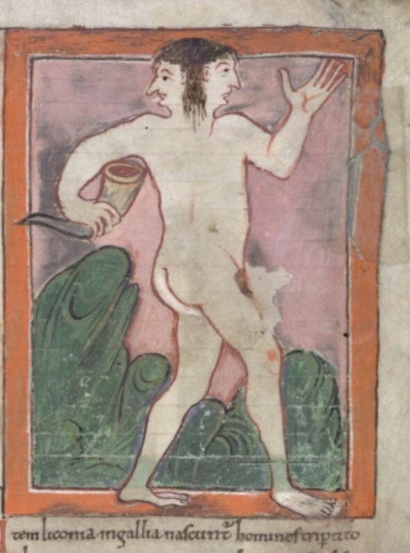 A nude figure with two faces in profile holds a horn and a knife against green hills, with a Latin caption below the miniature.