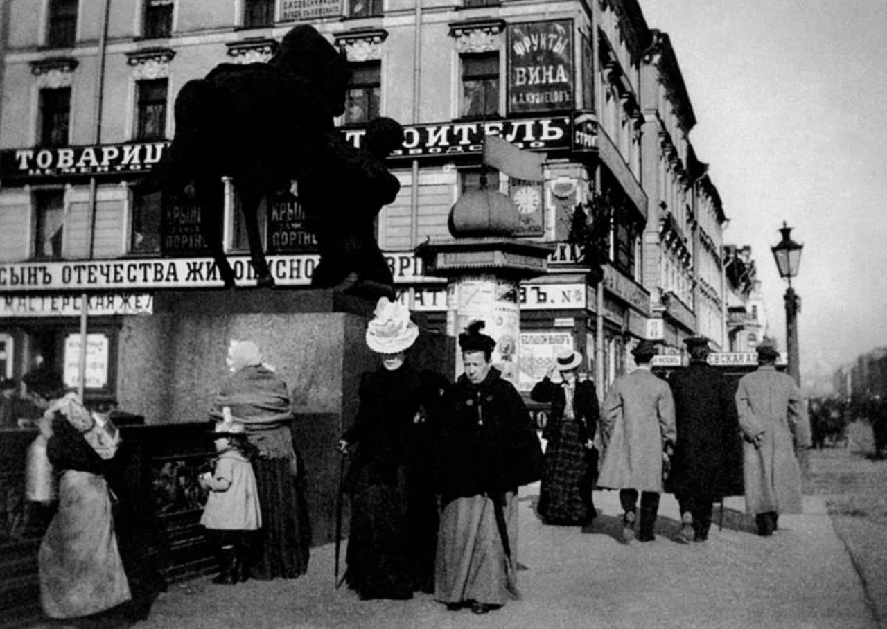 All in trousers cut to one pattern, With moustaches, overcoats and bowler hats, In the street I look like anybody, And I lose myself completely at the corners