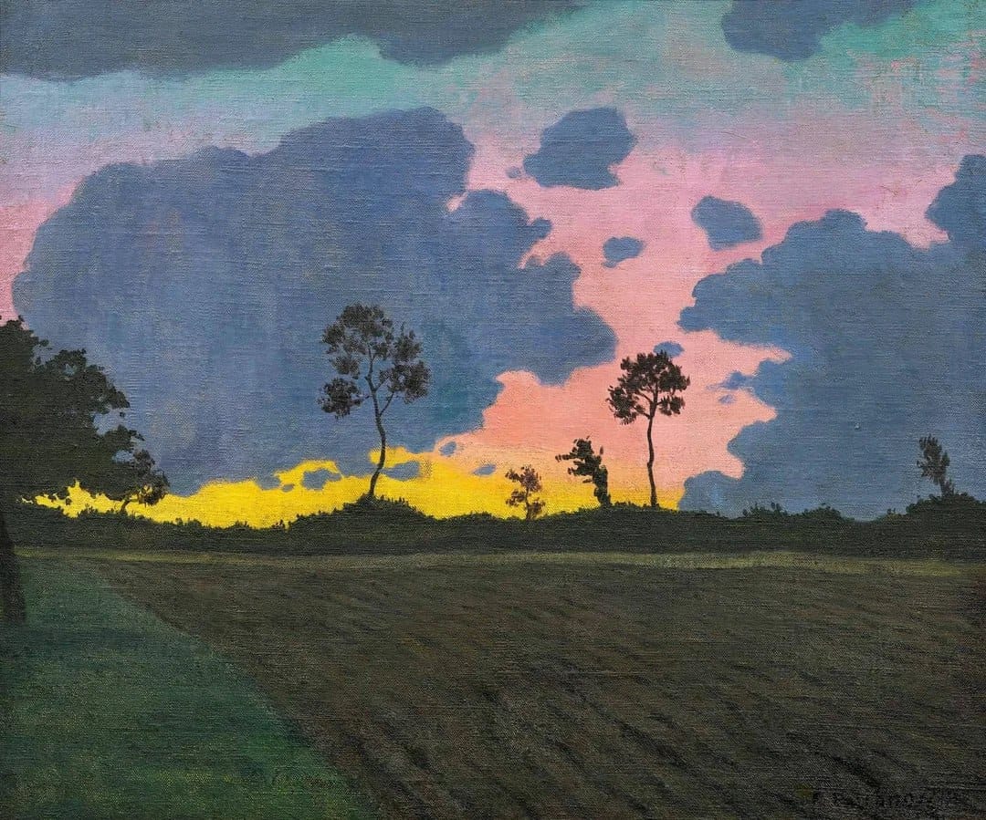 Landscape with dark silhouettes of trees above a ploughed field, a pink sky with a yellow strip at the horizon and grey-blue clouds.