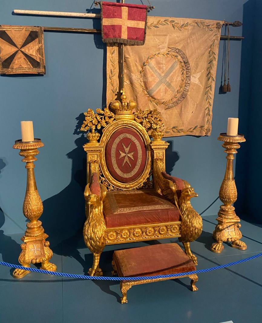 The throne chair of the Grand Master of the Order of Malta, with an embroidered Maltese cross on its back, made for Paul I in 1799-1800 to a design by the architect Giacomo Quarenghi