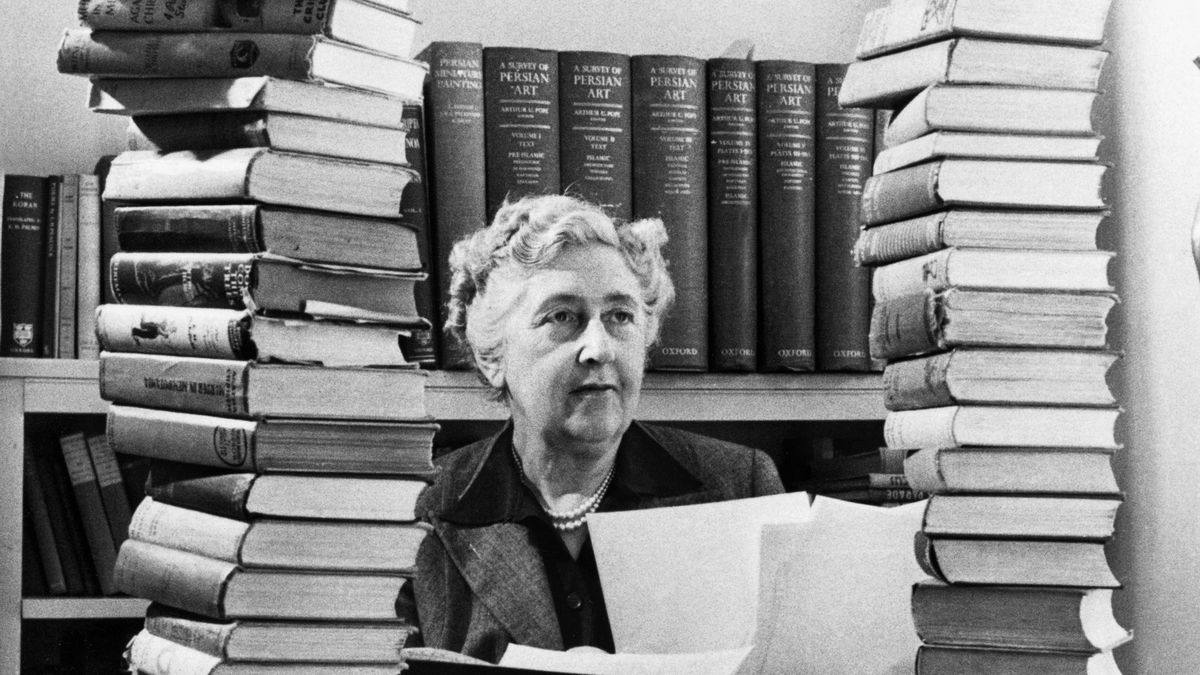 Agatha Christie Tries to Guess Which Pile of Books Will Collapse First