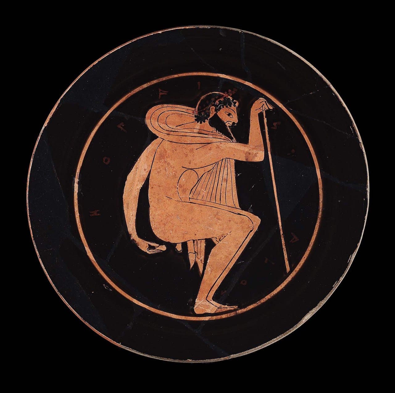 Scatological scene on the base of a Greek drinking vessel from around 500 BC