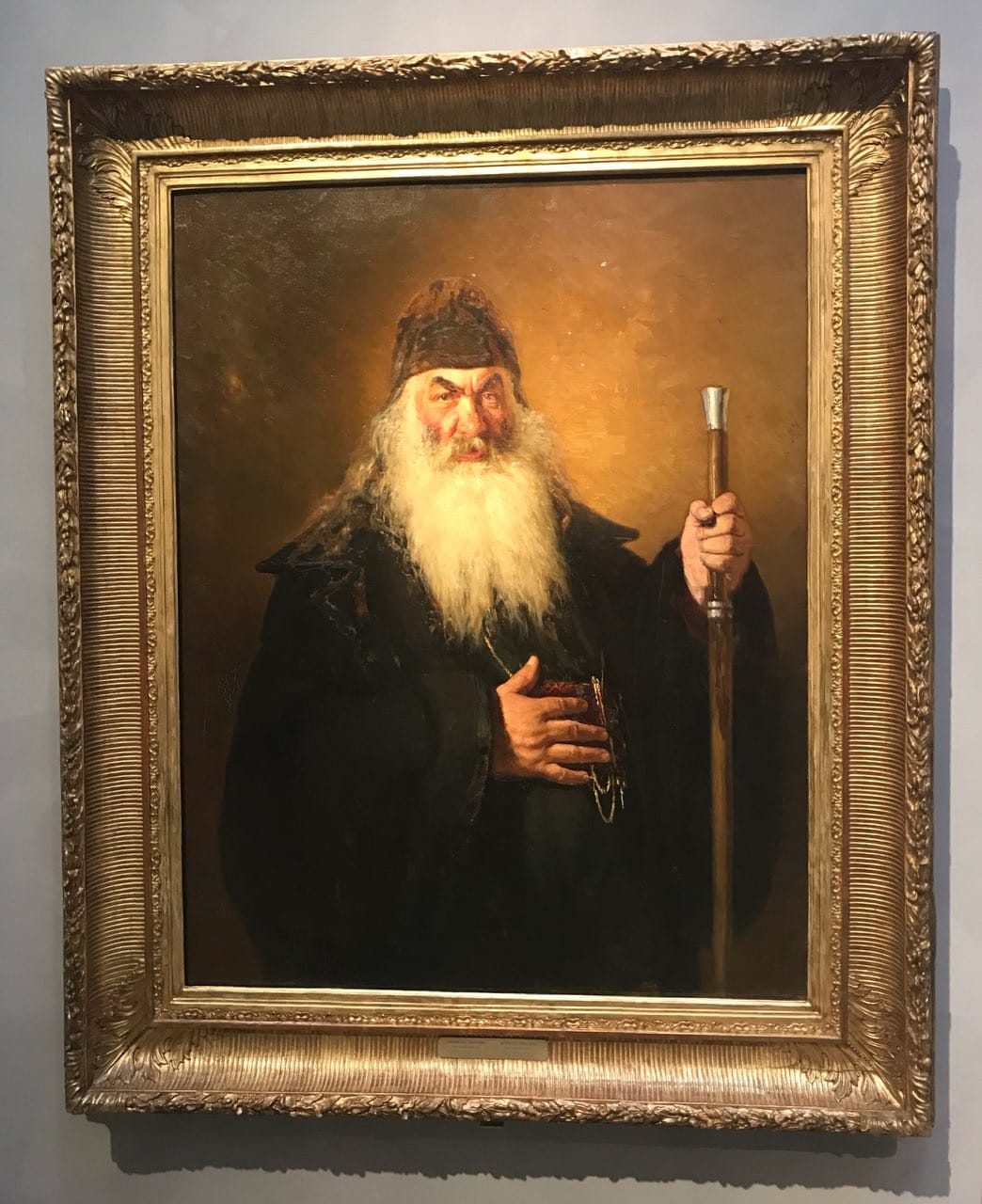 Репин 1924 жылы «Емен орманындағы крестті шеру» картинасындағы священниктің бетін қайта салды