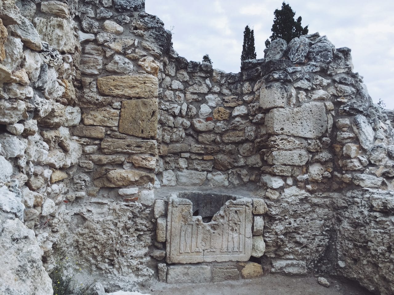 The interior baptistery of the church, with the early Christian symbol of fishes