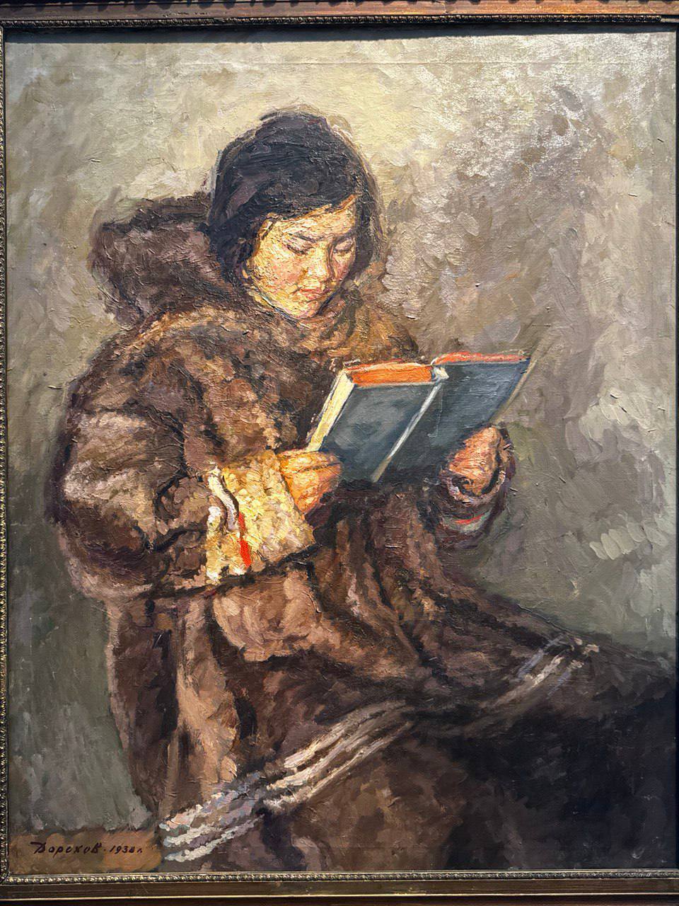 Jeune fille nenets avec un livre
