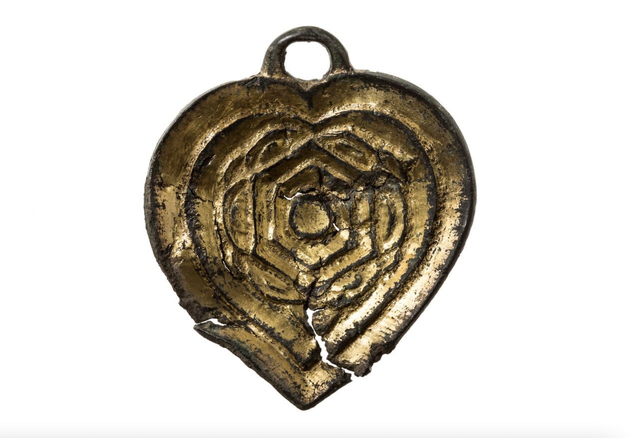 This is a gilded bronze earring from a tenth-century burial investigated by an expedition of the Academy of Sciences in the Sayan Mountains of southern Siberia