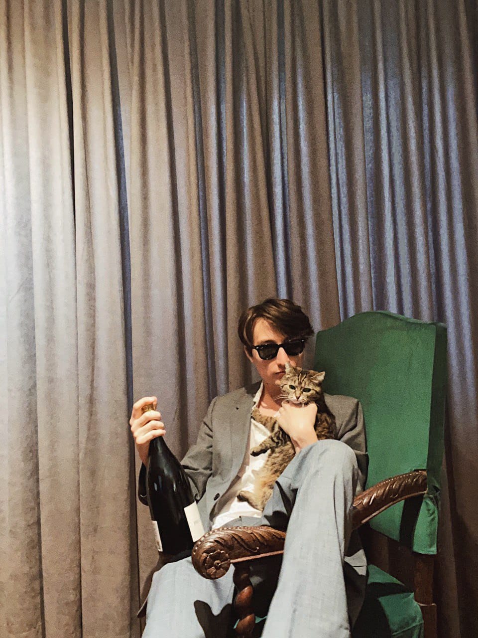 Greetings to @sncmag 💌 Seated in Margiela looks with Masya and a little bottle of Philipponnat in an eighteenth-century family armchair, pondering the fate of the motherland and not bored in the least!