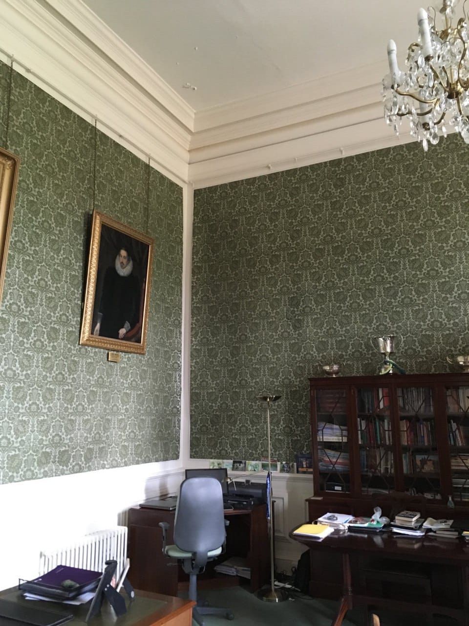 The very room in which Catherine of Aragon, who to her last day called herself Queen of England, the first wife of Henry VIII, died on 7 January 1536 is now the office of the headmaster of the prestigious Kimbolton boarding school