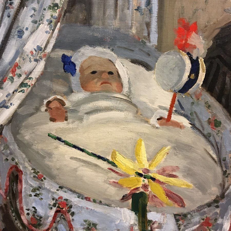 Detail of an oil painting: a baby in a white bonnet with a blue bow lies in a cradle with floral fabric, holding a red-handled drum rattle. A yellow flower is in the foreground.