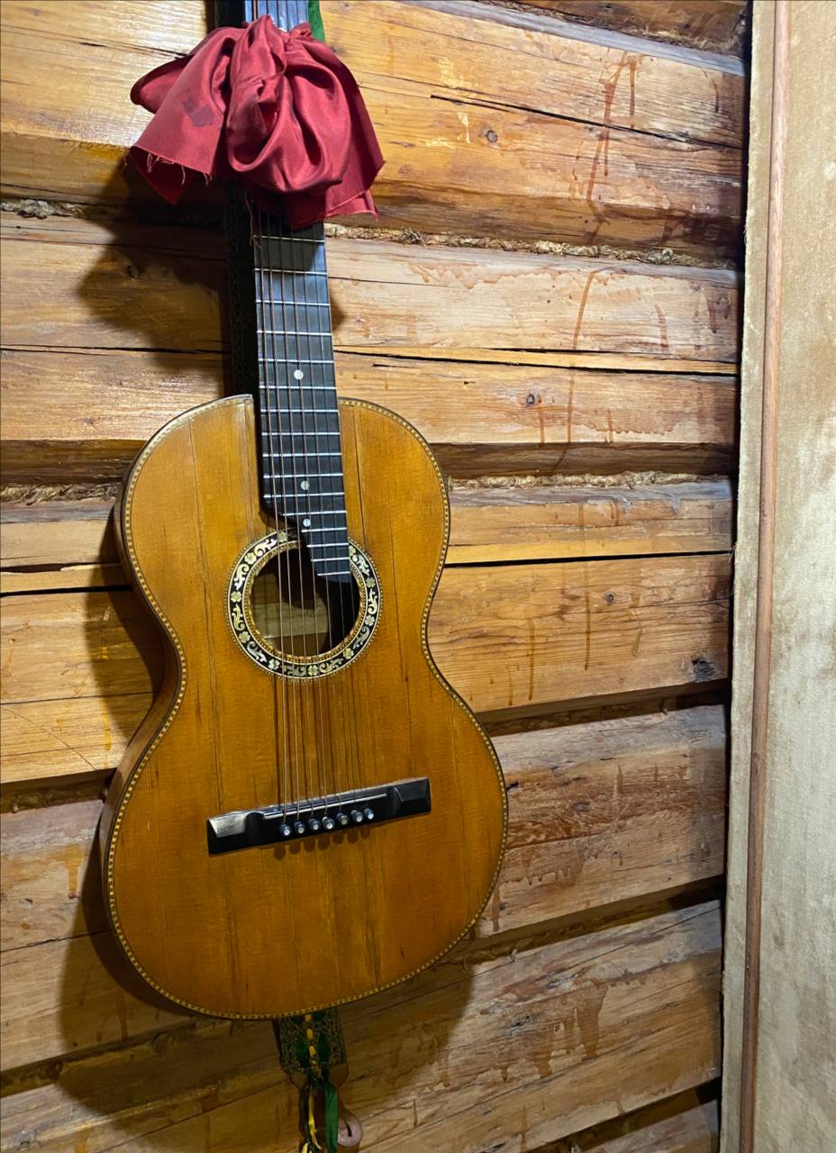 In Pushkin, a Singing Girl with a Guitar Tries to Lure the Eligible Bachelor Lensky: