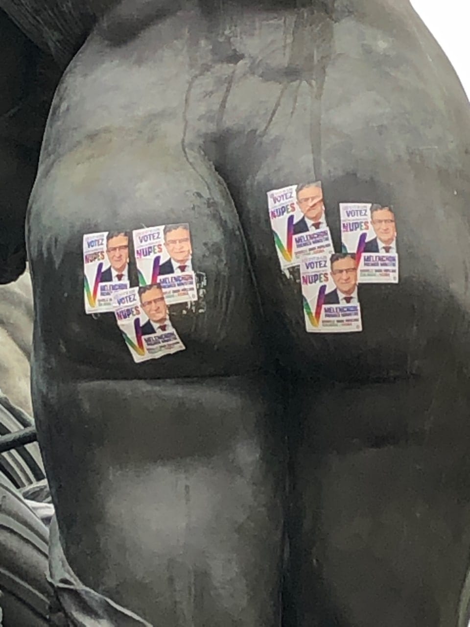 The bottom of the allegory of Abundance from the sculptural group Triumph of the Republic (1879–99) by the Louvre curator Jules Dalou is plastered with leaflets of Jean-Luc Mélenchon, leader of the alliance of France's left-wing forces, who has thus expre