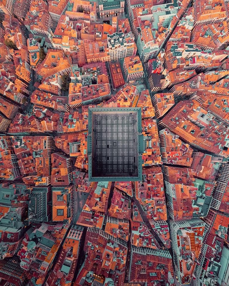 Plaza Mayor, Madrid: one of the principal squares of the Spanish capital, formed into a regular quadrangle by a line of dozens of adjoining buildings