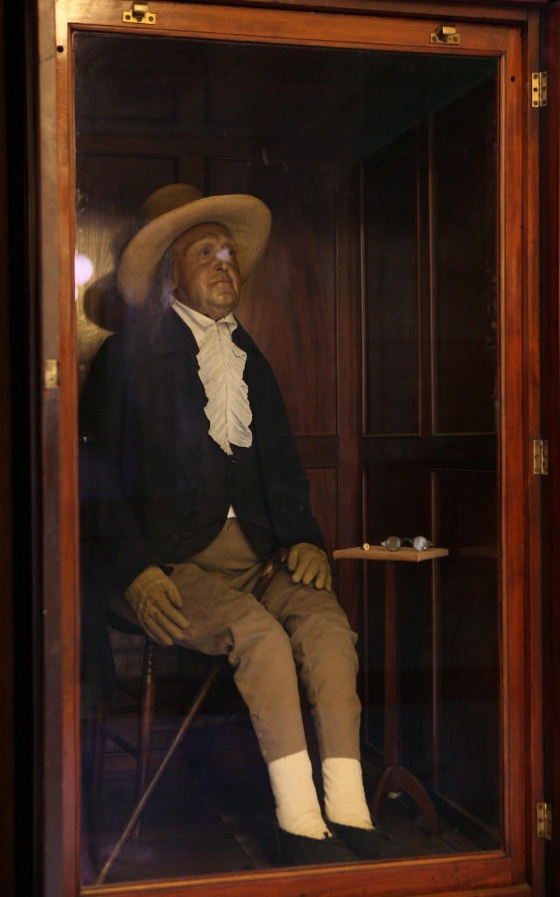 The body of the English philosopher Jeremy Bentham (1748–1832) is kept at University College London, seated in the pose in which the scholar liked to sit