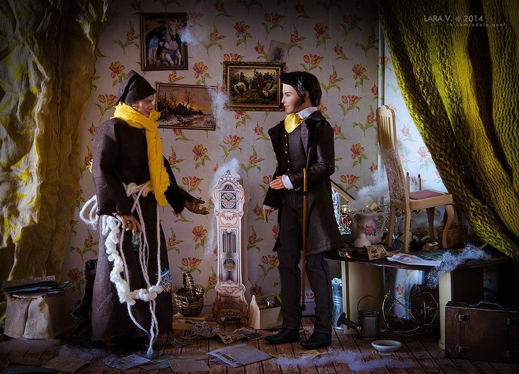 Two doll figures in a room with floral wallpaper: an old man in a dark robe and yellow scarf and a young man in a frock coat with a cane, amid cobwebs and papers.